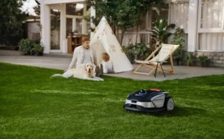 A wire-free robot mower navigates an unbounded yard using sensor fusion instead of perimeter cables.
