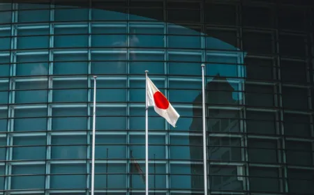 Bank of Japan officials discuss monetary policy adjustments during a rate decision meeting.