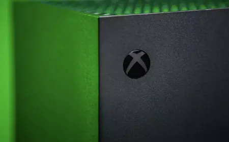 The Xbox logo appears on the exterior of a corporate office building.