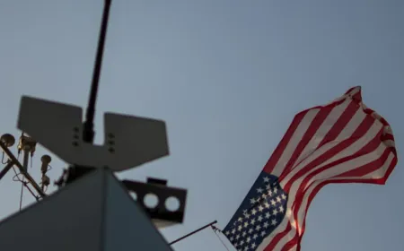 A US military aircraft disables a Palau-flagged oil tanker in the Gulf of Oman during a maritime blockade operation.