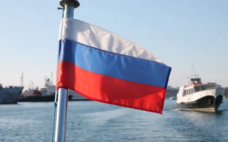 A Russian warship fires warning shots near a British yacht in the English Channel.