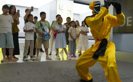 A humanoid robot demonstrates basic movements in a controlled testing environment.