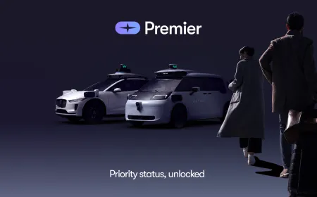 A Waymo autonomous vehicle is parked on a city street alongside promotional graphics for its new premium subscription tier.