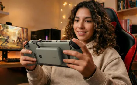 A Belkin charging grip attaches to the rear of a Nintendo Switch 2 console.
