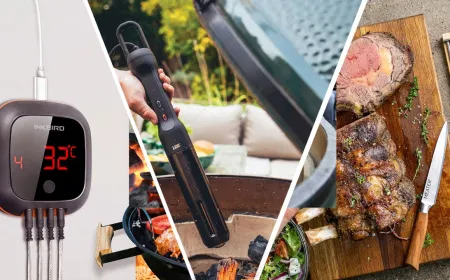 Assortment of precision grilling tools and temperature gauges laid out on a stainless steel prep table.