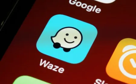Waze navigation interface displaying upcoming traffic light icons on a route map
