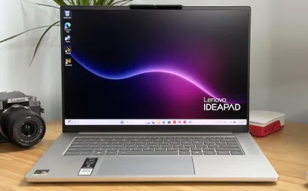 The Lenovo IdeaPad Slim 5x laptop is shown with its aluminum chassis and open screen.