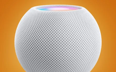 Apple HomePod mini and Apple TV 4K devices display an updated Siri artificial intelligence interface.