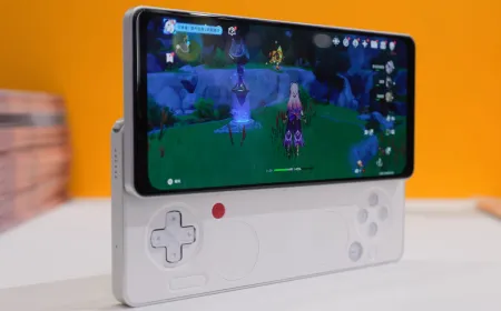The Ayaneo Pocket Play handheld gaming device features a sliding OLED display and physical controls.