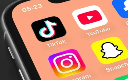 A teenager uses a smartphone while a parent monitors screen time.