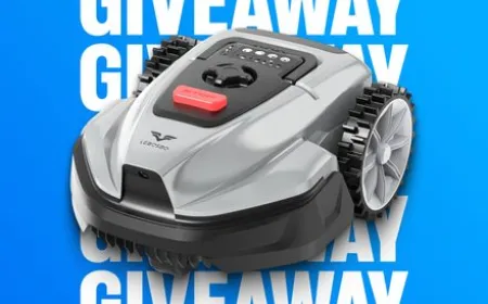The LEBOSBO V3 robotic lawn mower rests on a green lawn.