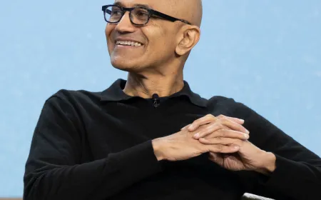 Satya Nadella speaking at The New York Times Hard Fork Live event about artificial intelligence.