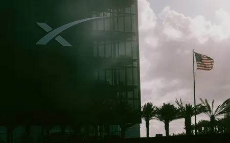 SpaceX logo on a dark background