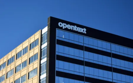A modern office building in Cork represents OpenText's €105 million investment and 400 new job creation initiative.