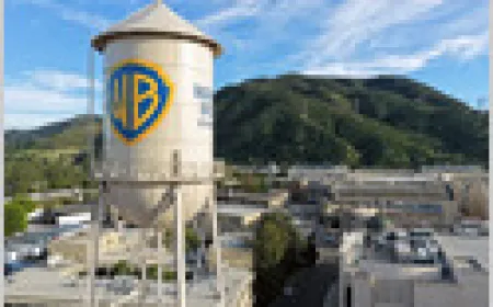 The graphic displays the Paramount and Warner Bros. Discovery logos alongside the US Department of Justice seal.