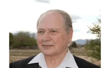 Ronald Wayne, Apple co-founder, reviews early partnership documents.