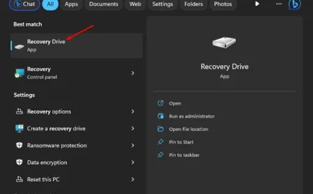 A USB flash drive connected to a computer displays the Windows 11 Recovery Drive setup wizard
