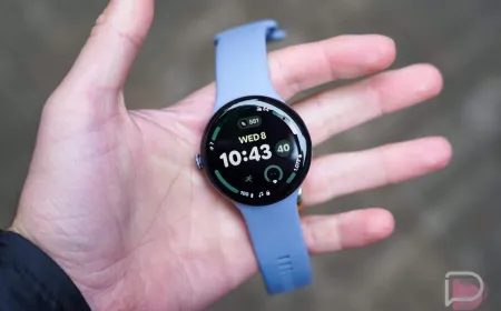The Pixel Watch displays the Wear OS 7 update screen during the initial rollout phase.