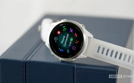 The Garmin Forerunner 570 smartwatch displays training metrics on its AMOLED screen.