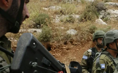 Israeli soldiers confront an armed individual near the Lebanon border at Ramim Ridge.