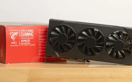The AMD Radeon RX 9070 GRE graphics card is displayed with its cooling fans and branding clearly visible.