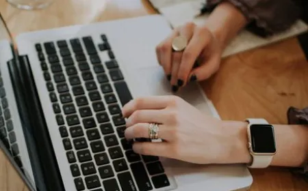 A digital interface displays real time carbon footprint metrics for laptop purchasing decisions.