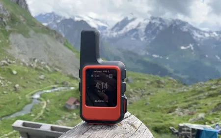 A Garmin inReach satellite messenger displays its emergency SOS interface for remote safety.