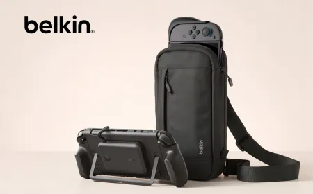 A Belkin charging grip is attached to a Nintendo Switch 2 console.